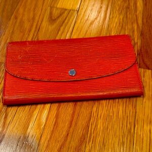 Louis Vuitton long wallet in orange Epi leather with dust bag